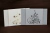 Karácsonyi üdvözlőlap - 155x100 mm - külső borító mozgatható-lehúzható
krém: vaj színű dombornyomással, arany fóliával - kékes-ezüst: kék dombornyomással, ezüst fóliával