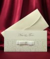    Esküvői meghívó - 210x105 mm - tasak: krémszínű karton, vajszínű fóliadíszítéssel - betétlap: krémszínű karton - elején szaténszalagból masni - boríték: krém
