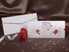  Esküvői meghívó - 215x200 mm - kihúzhatós - a lap elejére puzzleminta nyomtatva - kihúzáskor a szív összeér, az ablakban figurák változnak